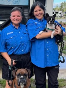 Connie Baldwin and Alicia Parham of Kleen Tank on the Road No. 6. Call us 850-758-8106.